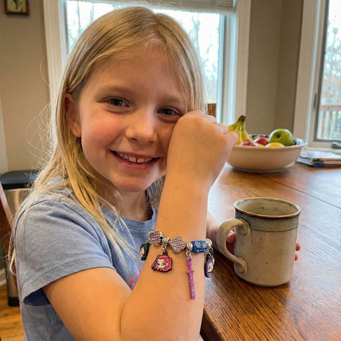 Bracelet-wearing photo displayed with the source listing's Sarah M. testimonial